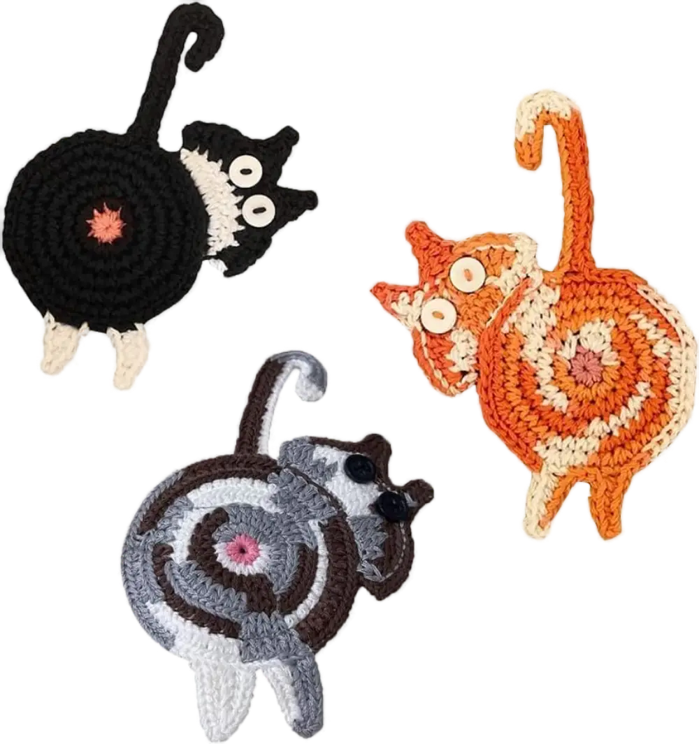 Set of three knitted drink coasters shaped like cats with a pink 'cat butthole' design in the center, perfect for quirky home decor and gifts.