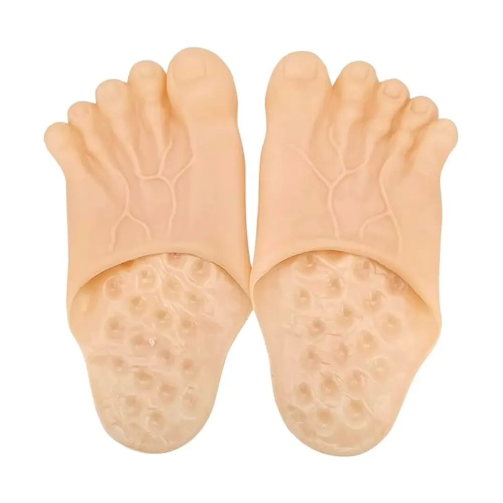 Pair of jumbo funny bare feet slippers with oversized toes and realistic skin tone, designed as a novelty gag gift for kids and adults.