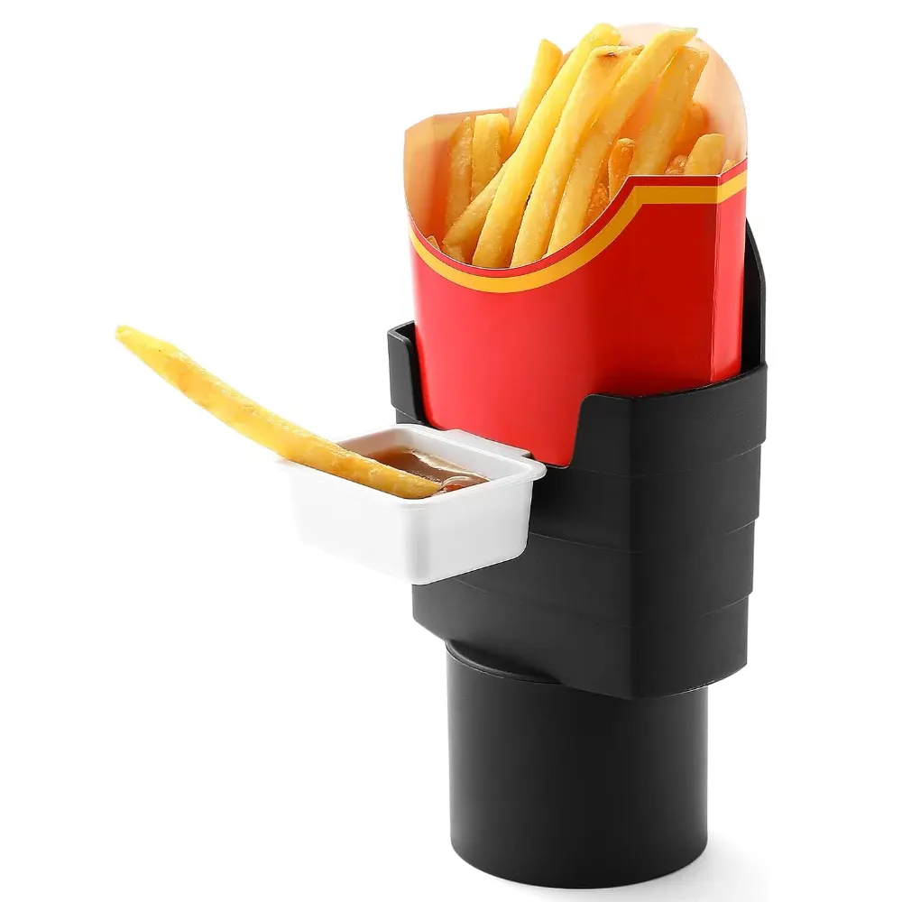 French fry holder and sauce holder set installed in a car cup holder and air vent, holding a carton of fries and dipping sauce for easy snacking while driving.