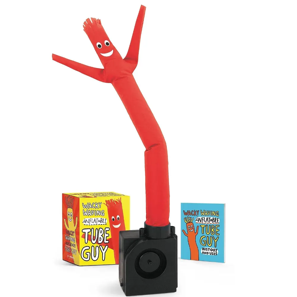 Mini “Wacky Waving Inflatable Tube Guy” kit in a colorful box, showing the red inflatable tube man dancing above the fan base next to a small booklet.